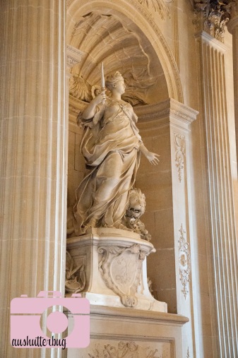 statue over the grand staircase